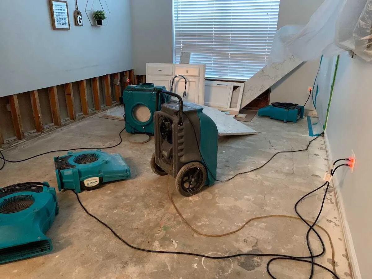 Dehumidifier in flood-cut room for Water Damage Restoration in Stamford